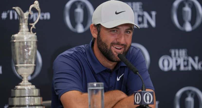 Scottie Scheffler of the United States speak at a press conference after winning the British Open golf championship at the Royal Portrush Golf Club, Northern Ireland, Sunday, July 20, 2025. (AP Photo/Jon Super)
