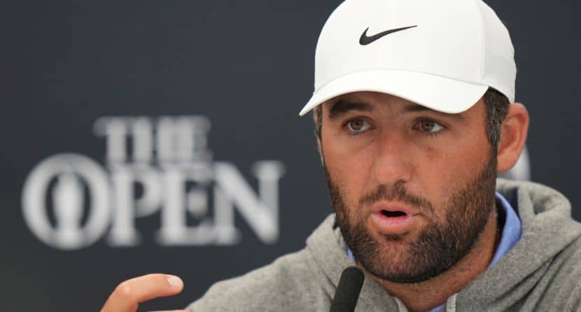 Scottie Scheffler of the United States gestures as he speaks during press conference ahead of the British Open golf championship at the Royal Portrush Golf Club, Northern Ireland, Tuesday, July 15, 2025. The Open starts Thursday. (AP Photo/Francisco Seco)