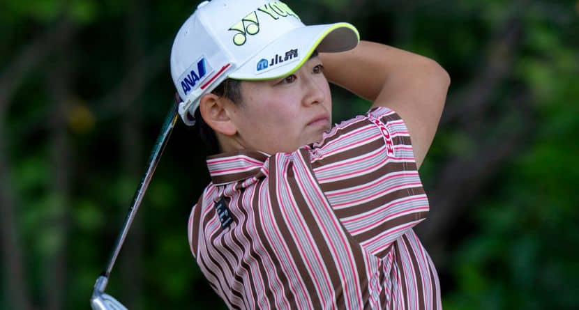 Akie Iwai, of Japan, watches her tee shot on the final hole during the first round of the Canadian Women's Open golf tournament Thursday, Aug. 21, 2025, in Mississauga, Ontario. (Frank Gunn/The Canadian Press via AP)