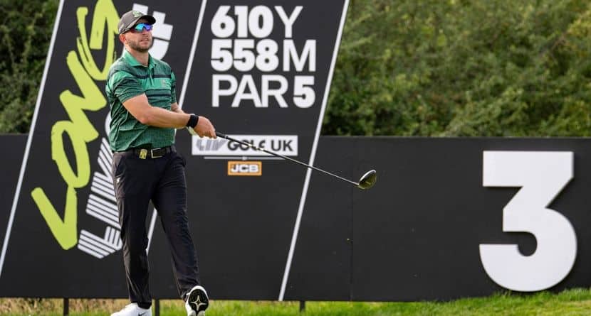 Dean Burmester of Stinger GC hits his shot from the third tee during the first round of LIV Golf United Kingdom at JCB Golf & Country Club on Friday, July 25, 2025 in Rocester, England. (Photo by Matthew Harris/LIV Golf via AP)