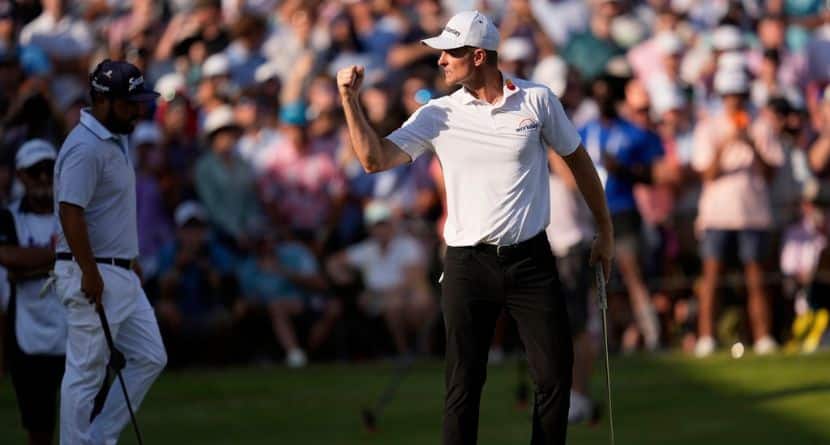 Justin Rose, of England, reacts after winning on the third playoff hole at the St. Jude Championship golf tournament Sunday, Aug. 10, 2025, in Memphis, Tenn. (AP Photo/George Walker IV)