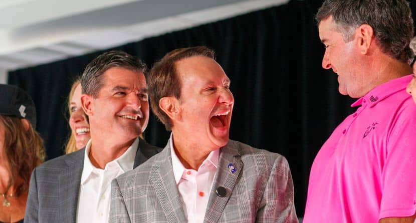 Louisiana Gov. Jeff Landry, center, stands between LIV CEO Scott O'Neil, left, and golfer Bubba Watson during a press event, Wednesday, Aug. 27, 2025, in New Orleans, announcing the LIV Golf Louisiana tournament in New Orleans next year. (John McCusker/The Times-Picayune/The New Orleans Advocate via AP)