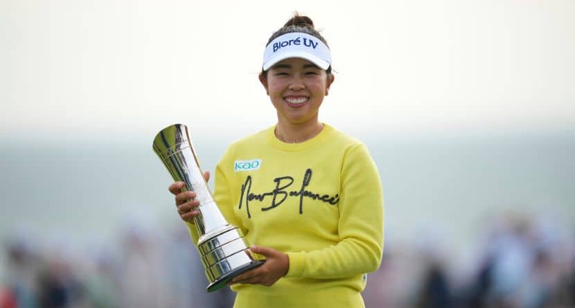 Miyu Yamashita of Japan poses with her trophy after winning the Women's British Open golf championship, at Royal Porthcawl Golf Club in Porthcawl, Wales, Sunday, Aug. 3, 2025. (AP Photo/Kin Cheung)