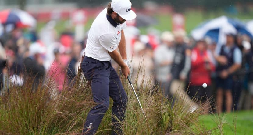 United States' Cameron Young hits from the rough on the 16th hole during a practice round at the Ryder Cup golf tournament, Thursday, Sept. 25, 2025, on the Bethpage Black golf course, in Farmingdale, N.Y. (AP Photo/Robert Bukaty)