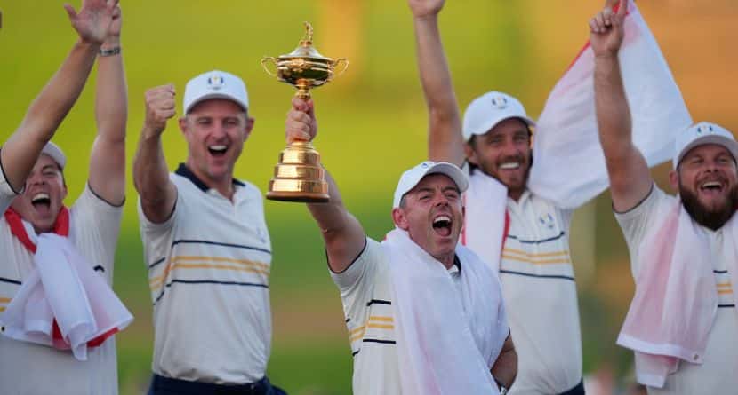 Europe's Rory McIlroy poses with the trophy after winning the Ryder Cup golf tournament against the United States on the Bethpage Black golf course, Sunday, Sept. 28, 2025, in Farmingdale, N.Y. (AP Photo/Seth Wenig)