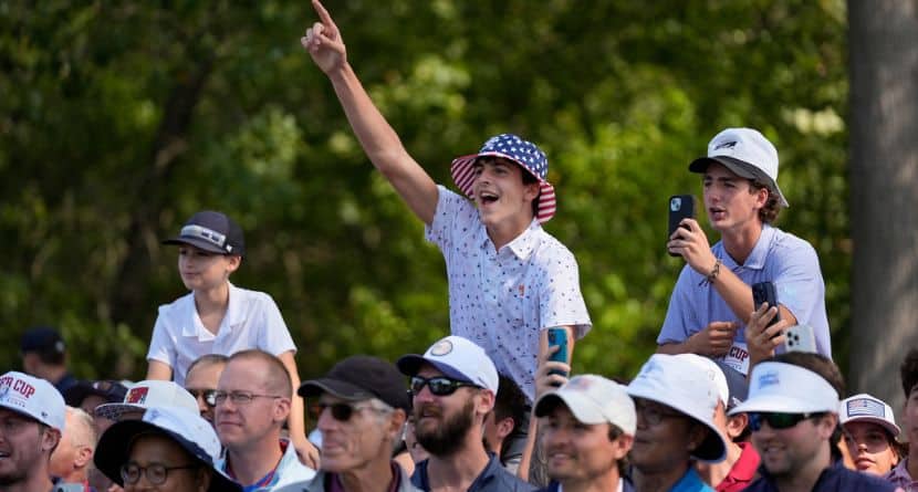 Fans react during a practice round for the Ryder Cup golf tournament, Tuesday, Sept. 23, 2025, in Farmingdale, N.Y., at Bethpage State Park's Black Course. (AP Photo/Robert Bukaty)