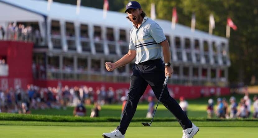 Europe's Tommy Fleetwood celebrates after a birdie on the 16th hole at Bethpage Black golf course during the Ryder Cup golf tournament, Friday, Sept. 26, 2025, in Farmingdale, N.Y. (AP Photo/Lindsey Wasson)