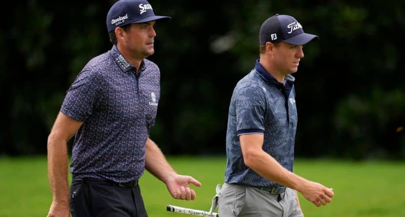 Keegan Bradley and Justin Thomas walks in the second fairway during the third round of the Tour Championship golf tournament, Saturday, Aug. 23, 2025, in Atlanta. (AP Photo/Mike Stewart)