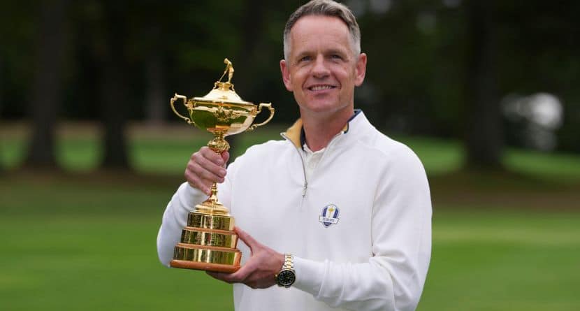 2025 European Ryder Cup Captain, Luke Donald poses with the trophy before a practice round for the Ryder Cup golf tournament, Tuesday, Sept. 23, 2025, in Farmingdale, N.Y., at Bethpage State Park