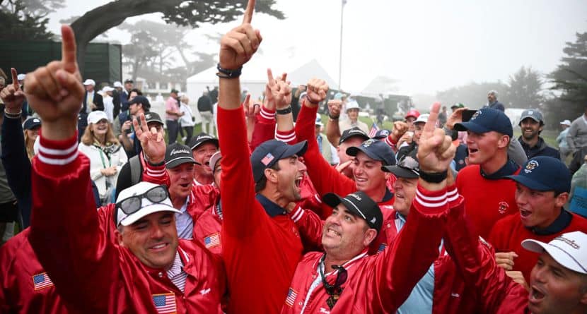 The USA team players and supporters celebrate after defeating the Great Britain and Ireland team in the Walker Cup golf tournament at Cypress Point Club on Sunday, Sept. 7, 2025, in Pebble Beach, Calif. (AP Photo/Thien-An Truong)