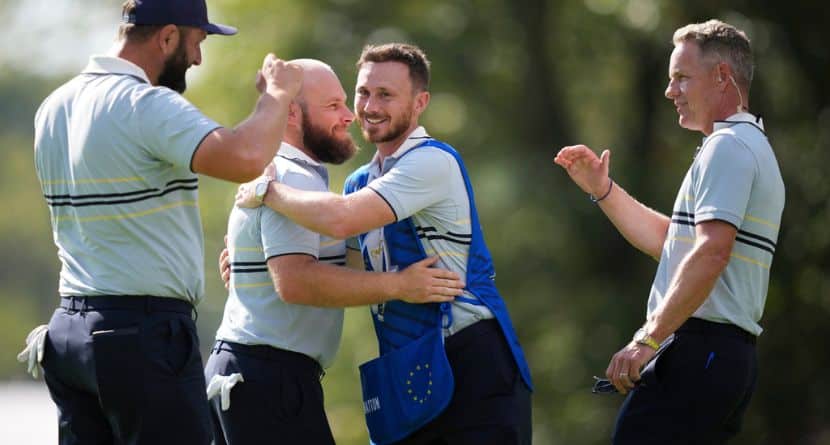 Europe's Jon Rahm, Tyrrell Hatton and captain Luke Donald celebrate after their win on the 15th hole at Bethpage Black golf course during the Ryder Cup golf tournament, Friday, Sept. 26, 2025, in Farmingdale, N.Y. (AP Photo/Matt Slocum)
