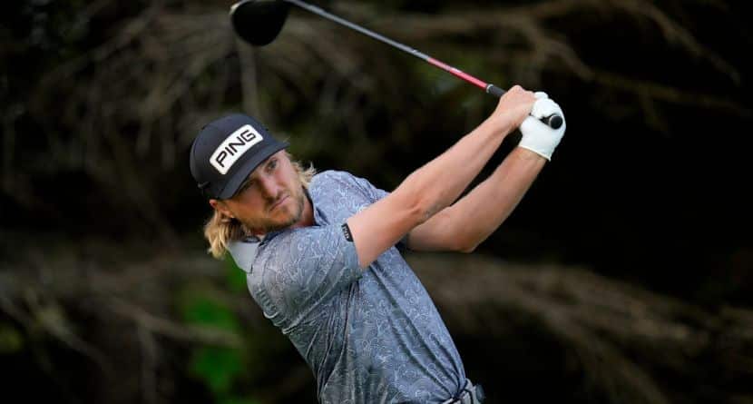 Austin Cook watches his tee shot on the second hole during the second round of the 3M Open golf tournament at the Tournament Players Club, Friday, July 26, 2024, in Blaine, Minn. (AP Photo/Charlie Neibergall)