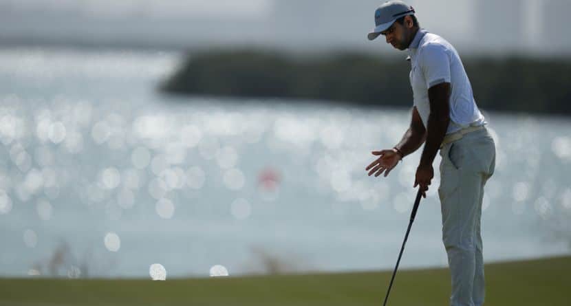 Aaron Rai of England reacts after missing a putt on the 8th hole during the final round of the Abu Dhabi Golf Championship in Abu Dhabi, United Arab Emirates, Sunday, Nov. 9, 2025. (AP Photo/Altaf Qadri)