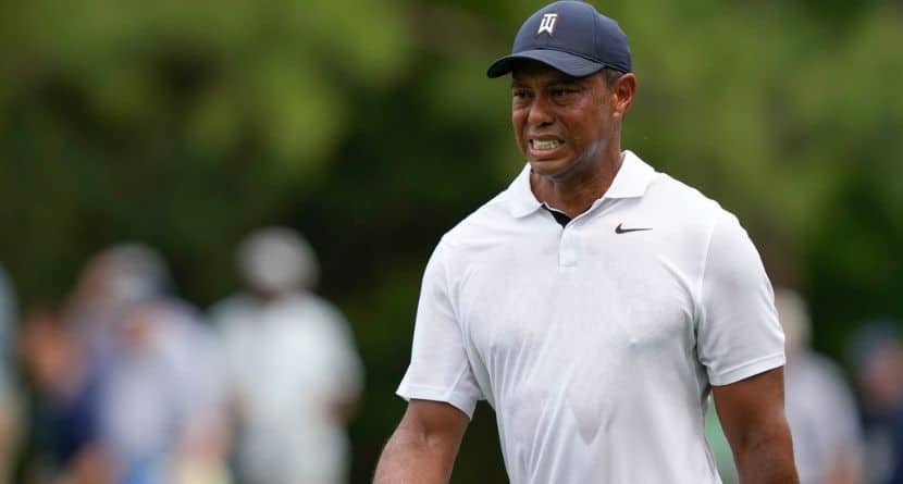 Tiger Woods grimaces on the 15th hole during the first round of the Masters golf tournament at Augusta National Golf Club on Thursday, April 6, 2023, in Augusta, Ga. (AP Photo/David J. Phillip)