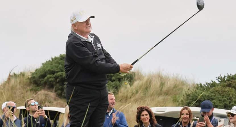 United States President Donald Trump tees off during the opening ceremony for the Trump International Golf Links golf course, near Aberdeen, Scotland, July 29, 2025. (AP Photo/Jacquelyn Martin)