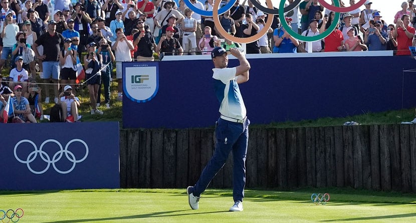 Victor Perez, of France, plays his tee shot off the first tee during the first round of the men's golf event at the 2024 Summer Olympics, Thursday, Aug. 1, 2024, at Le Golf National in Saint-Quentin-en-Yvelines, France. (AP Photo/George Walker IV)