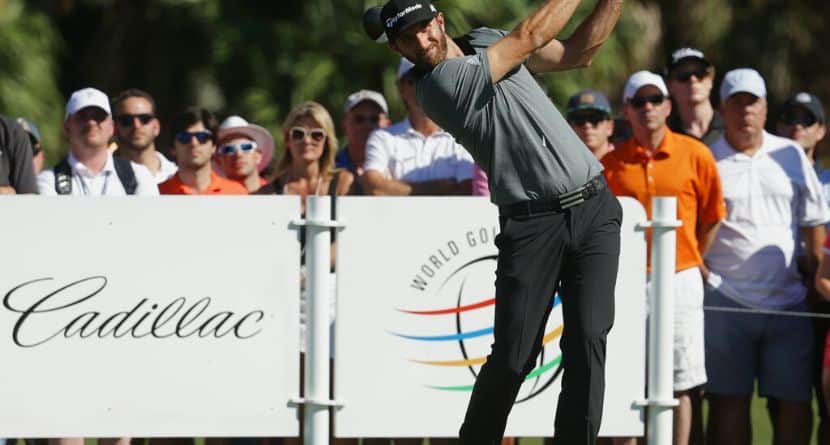 Dustin Johnson hits from the seventh tee during the final round of the Cadillac Championship golf tournament, Sunday, March 6, 2016, in Doral, Fla. (AP Photo/Lynne Sladky)