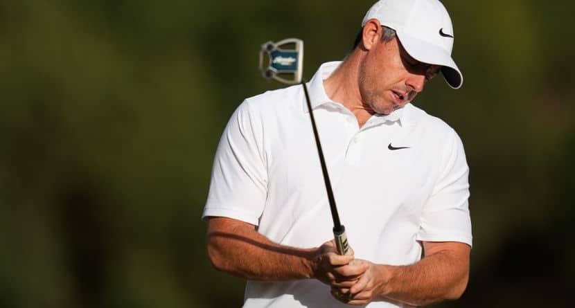 Rory McIlroy. of Northern Ireland, reacts after putting on the the 11th hole during the first round of the Australian Open golf tournament in Melbourne, Australia, Thursday, Dec. 4, 2025. (AP Photo/Asanka Brendon Ratnayake)
