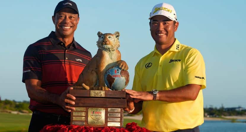 Hideki Matsuyama, of Japan, right, poses for a photo with golf legend Tiger Woods after winning the Hero World Challenge PGA Tour at the Albany Golf Club, in New Providence, Bahamas, Sunday, Dec. 7, 2025. (AP Photo/Fernando Llano)