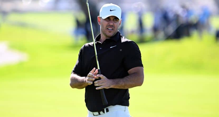 Brooks Koepka reacts after missing a birdie putt on the fourth hole on the South Course at Torrey Pines during the first round of the Farmers Insurance Open golf tournament Thursday, Jan. 29, 2026, in San Diego. (AP Photo/Denis Poroy)