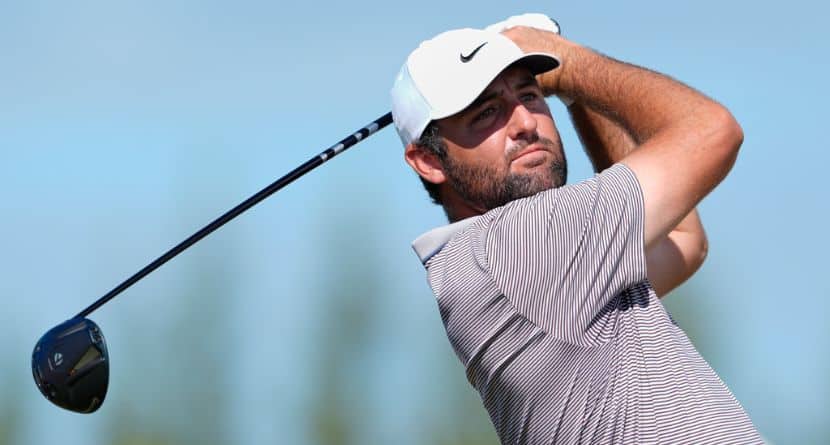 cottie Scheffler, of the United States, watches his tee-off at the fourth hole during the final round of the Hero World Challenge PGA Tour at the Albany Golf Club in New Providence, Bahamas, Dec. 7, 2025. (AP Photo/Fernando Llano)