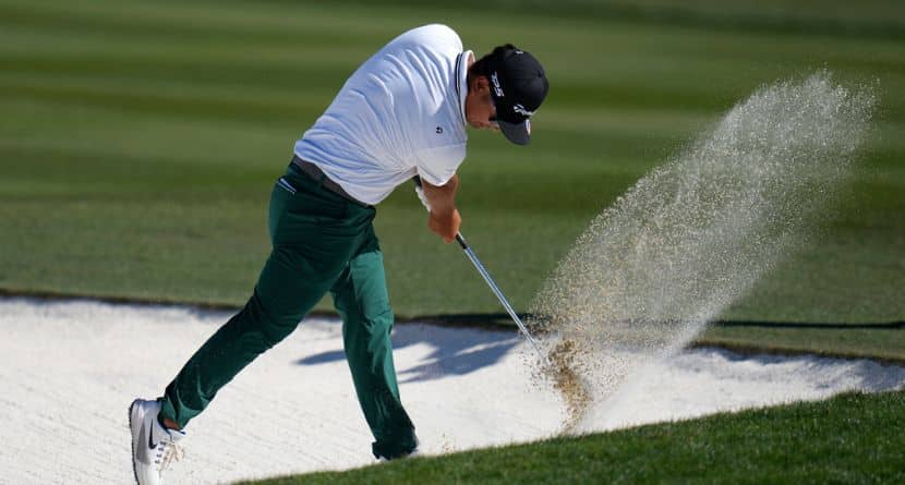 Ryo Hisatsune, of Japan, slams his club into the sand of a fairway bunker at the 10th hole after hitting a shot during the final round of the Phoenix Open golf tournament Sunday, Feb. 8, 2026, in Scottsdale, Ariz. (AP Photo/Ross D. Franklin)
