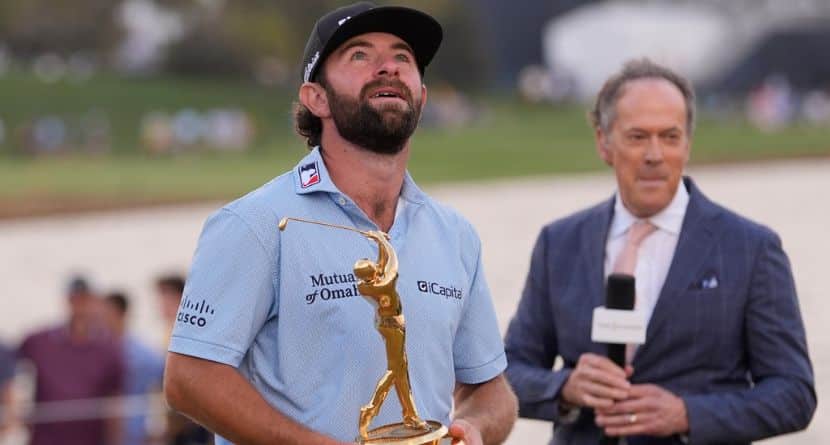 Cameron Young holds the The Players Championship Trophy after winning the final round of The Players Championship golf tournament, Sunday, March 15, 2026, in Ponte Vedra Beach, Fla. (AP Photo/Gerald Herbert)