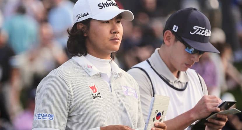 S.H. Kim of South Korea walks to the 17th tee during the first round of The Players Championship golf tournament Thursday, March 12, 2026, in Ponte Bedra Beach, Fla. (AP Photo/Gerald Herbert)