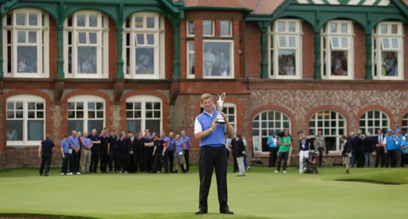 Ernie Els of South Africa holds the Claret Jug trophy after winning the British Open Golf Championship at Royal Lytham & St Annes golf club, Lytham St Annes, England Sunday, July 22, 2012. (AP Photo/Jon Super)