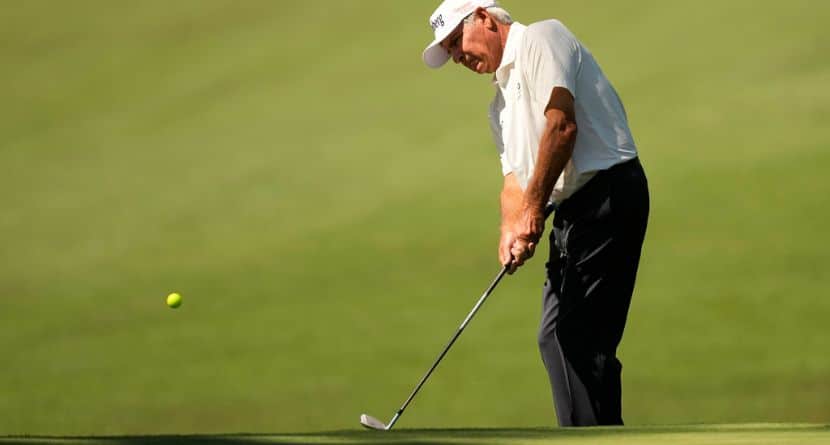 Fred Couples chips to the green on the 10th hole during the first round of the Masters golf tournament at the Augusta National Golf Club, Thursday, April 9, 2026, in Augusta, Ga. (AP Photo/Gerald Herbert)