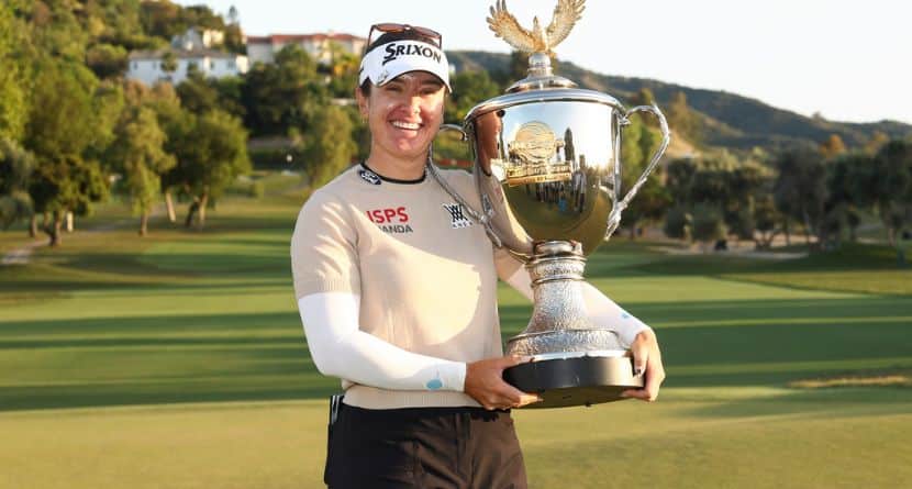 Hannah Green poses with the trophy after winning the LPGA JM Eagle LA Championship golf tournament at El Caballero Country Club Sunday, April 19, 2026, in Los Angeles. (AP Photo/Jessie Alcheh)