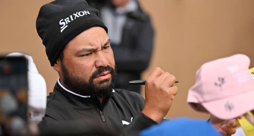J.J. Spaun signs autographs after the fourth round of the Valero Texas Open golf tournament in San Antonio, Sunday, April 5, 2026. (AP Photo/Darren Abate)
