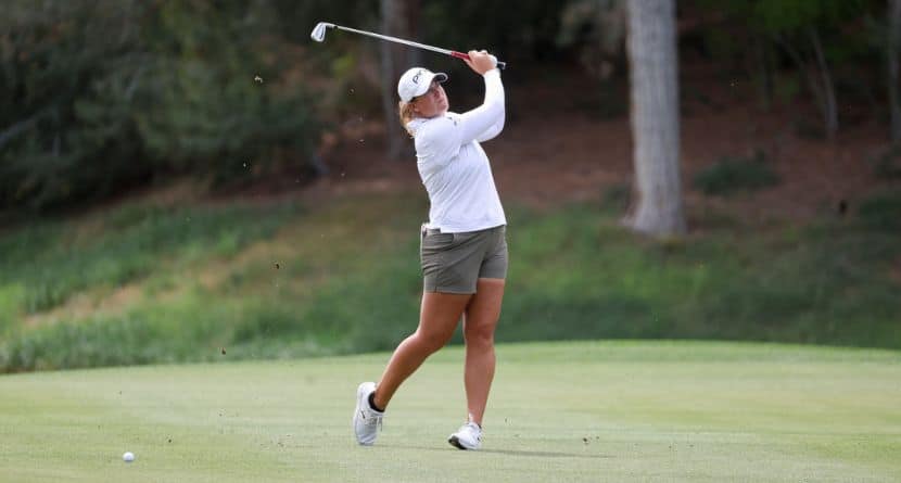 Lauren Coughlin hits an approach shot on the ninth hole during the first round of the Aramco Championship LPGA golf tournament, Thursday, April 2, 2026, in North Las Vegas. (AP Photo/Ian Maule)