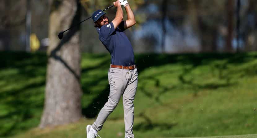 Mark Hubbard hits from the fairway on the ninth hole on the North Course at Torrey Pines during the first round of the Farmers Insurance Open golf tournament Thursday, Jan. 29, 2026, in San Diego. (AP Photo/Caroline Brehman)