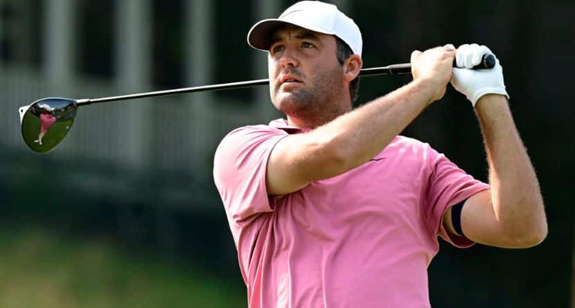 Scottie Scheffler tees off the first playoff hole of the Travelers Championship golf tournament at TPC River Highlands, Monday, June 29, 2026, in Cromwell, Conn. (AP Photo/Jessica Hill)