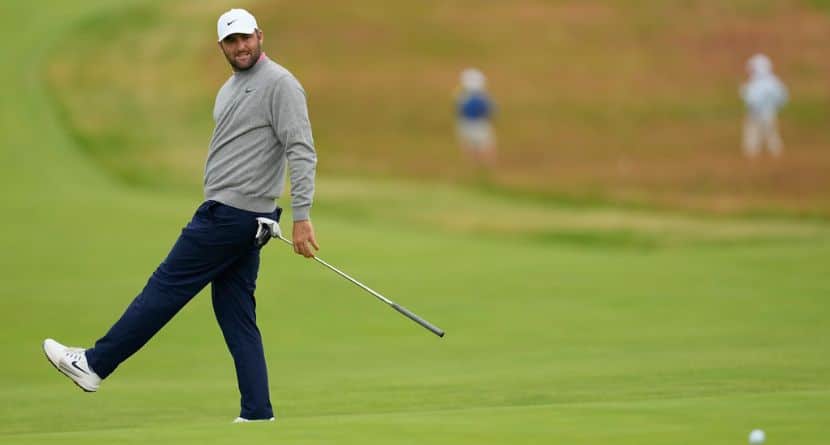 Scottie Scheffler reacts after missing a putt on the third hole during the first round of the U.S. Open golf tournament at Shinnecock Hills Golf Club in Southampton, N.Y., Thursday, June 18, 2026.(AP Photo/David J. Phillip)