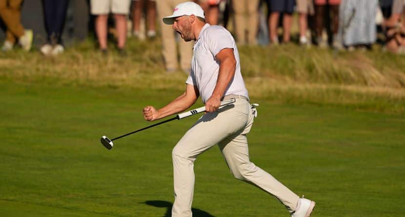 Wyndham Clark celebrates after a birdie on the 16th hole during the final round of the U.S. Open golf tournament at Shinnecock Hills Golf Club in Southampton, N.Y., Sunday, June 21, 2026. (AP Photo/Gerald Herbert)