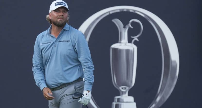 Daniel Brown of England watches where his shot has landed after playing off the 1st tee during the first day of the British Open Golf championships at Royal Birkdale golf club, in Southport, England, Thursday, July 16, 2026. (AP Photo/Jon Super)