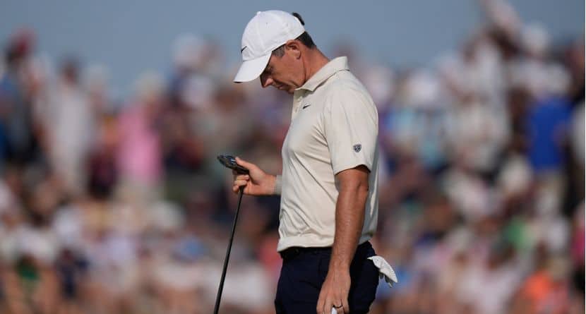 Rory McIlroy of Northern Ireland looks at his club after putting on the 9th green during the first day of the British Open Golf championships at Royal Birkdale golf club, in Southport, England, Thursday, July 16, 2026. (AP Photo/David Goldman)