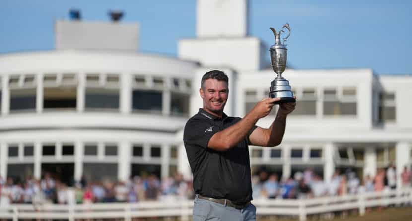 Ryan Fox of New Zealand poses with the Claret Jug trophy in front of the club house, after winning the British Open Golf championships at Royal Birkdale golf club, in Southport, England, Sunday, July 19, 2026. (AP Photo/Jon Super)