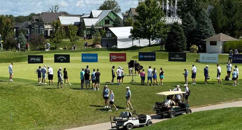 LIV Golf fans gather at the practice putting green before the final round of the season-ending event in suburban Indianapolis, Ind., Sunday, Aug. 23, 2026. (AP Photo/Michael Marot)