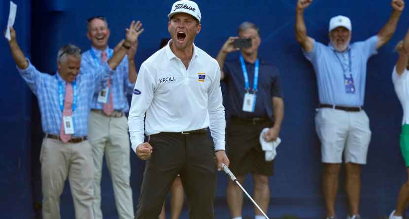 Michael Brennan reacts after winning the Wyndham Championship golf tournament in Greensboro, N.C., Sunday, Aug. 9, 2026. (AP Photo/Chuck Burton)