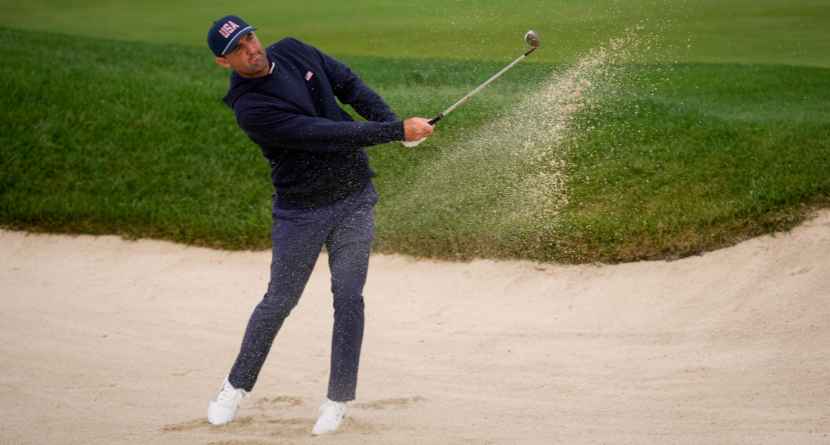 USA teams' Scottie Scheffler practices on the fifth hole prior to the start of the Presidents Cup golf tournament against the International team at Medinah Country Club, Monday, Sept. 21, 2026, in Medinah, Ill. (AP Photo/Matt Slocum)