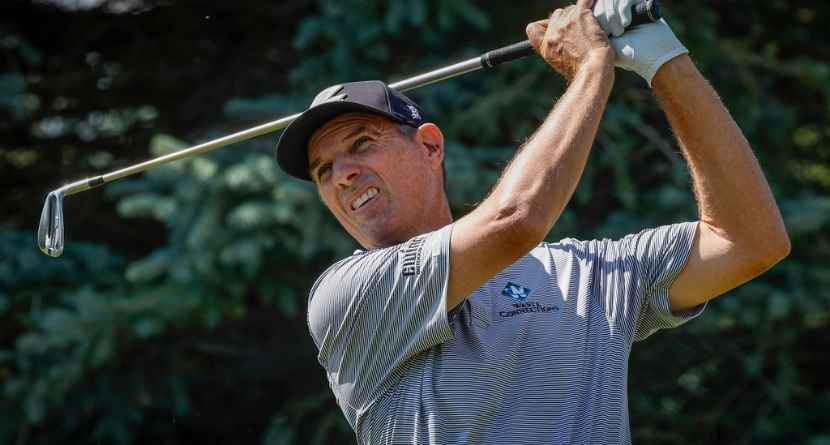 New Zealand's Stephen Alker hits a tee shot on the fifth hole during the PGA Tour Champions golf event in Calgary, Alberta, Sunday, Aug. 23, 2026. (Jeff McIntosh/The Canadian Press via AP)