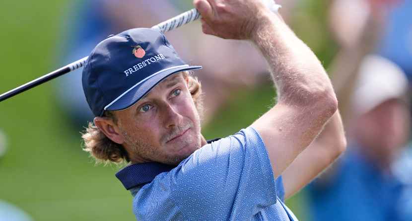 Austin Smotherman hits off the 18th tee during the second round of The Players Championship golf tournament Friday, March 13, 2026, in Ponte Vedra Beach, Fla. (AP Photo/Gerald Herbert)