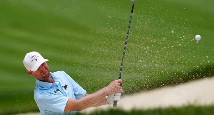 Vaughn Taylor hits out of a bunker on the ninth green during the third round of the John Deere Classic golf tournament, Saturday, July 2, 2022, at TPC Deere Run in Silvis, Ill. (AP Photo/Charlie Neibergall)